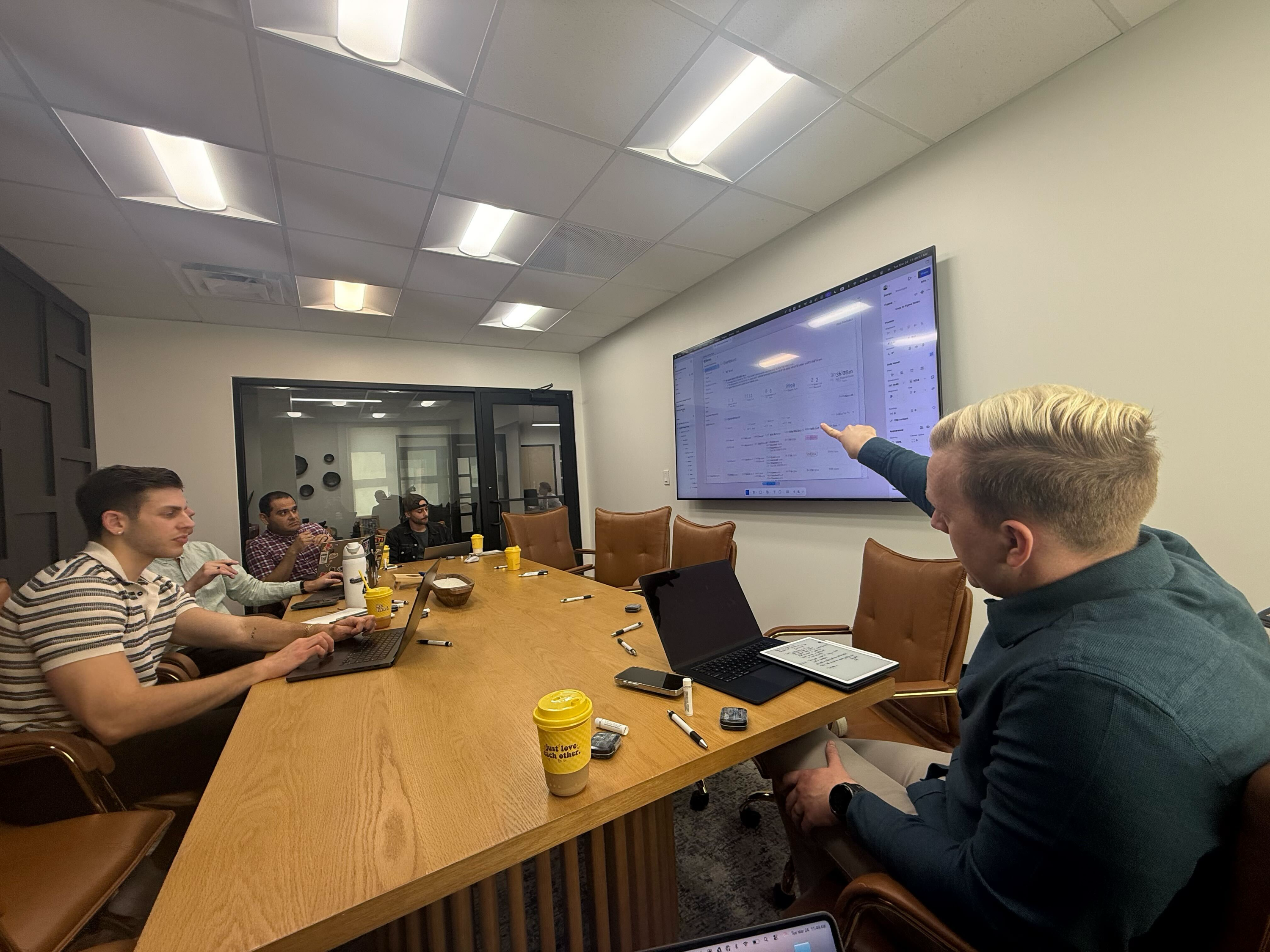 The team collaborating during a rapid iteration sprint at our partner firm in Dallas