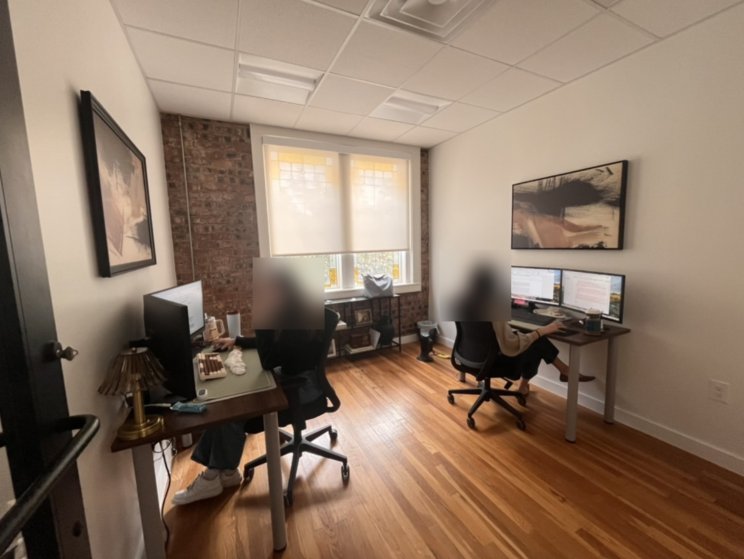 Lawyers at a Dallas partner firm doing day-to-day contract work, faces obscured for privacy